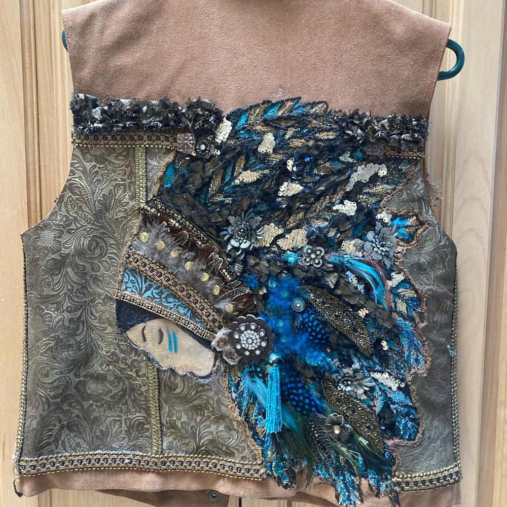 Indian head dress suede vest. One of a kind.